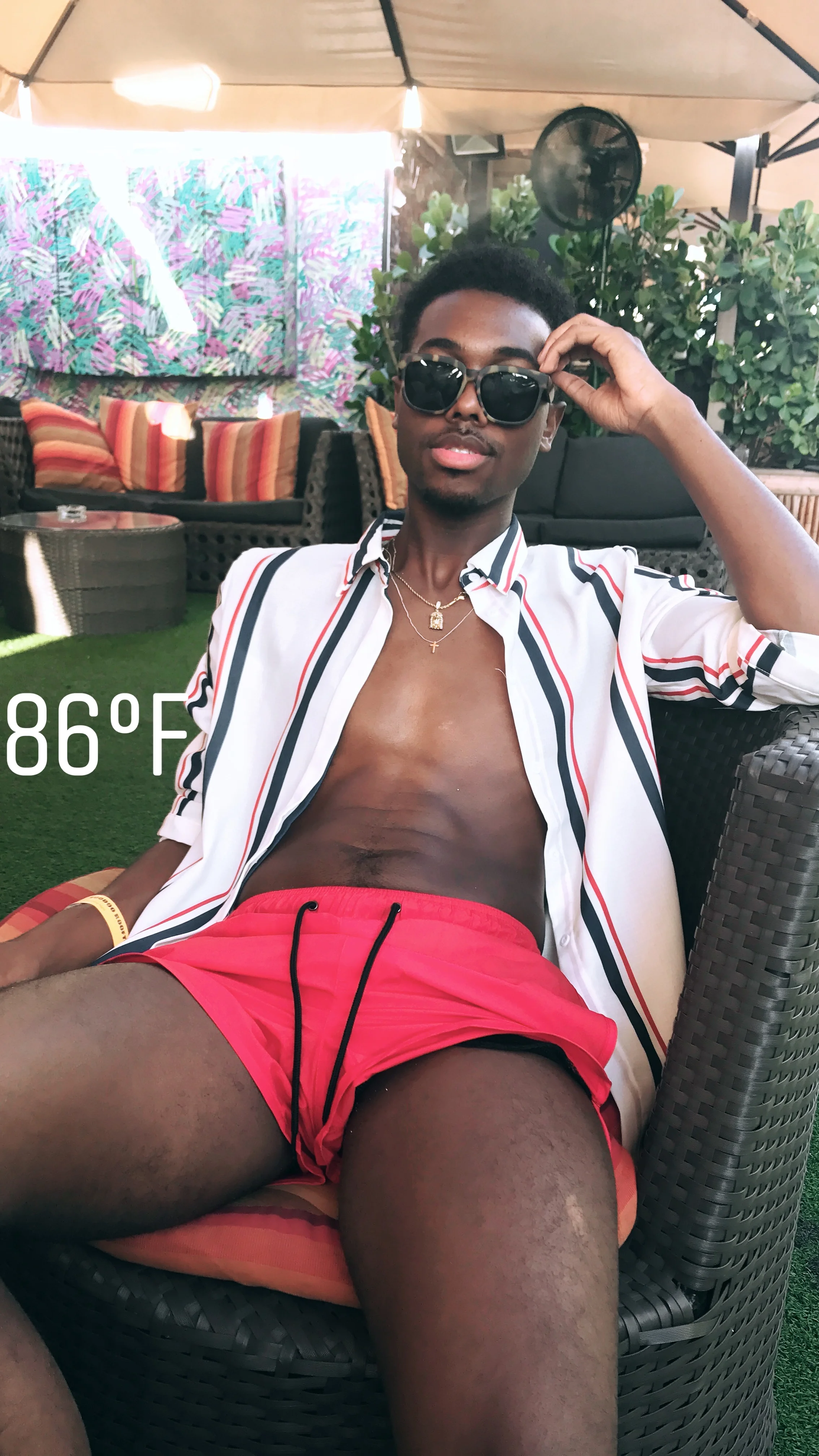 My shirt is SheIn and my swim trunks are H&M