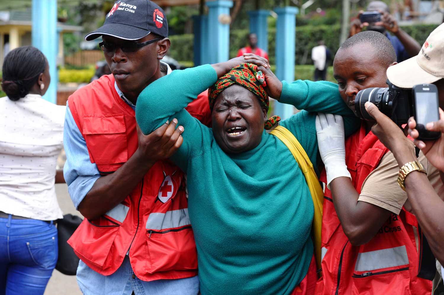 A woman is stricken with grief after the Garissa University College attack. The shockwaves led local communities to come together in rejecting further violence. Photo: Stringer/AP/REX/Shutterstock