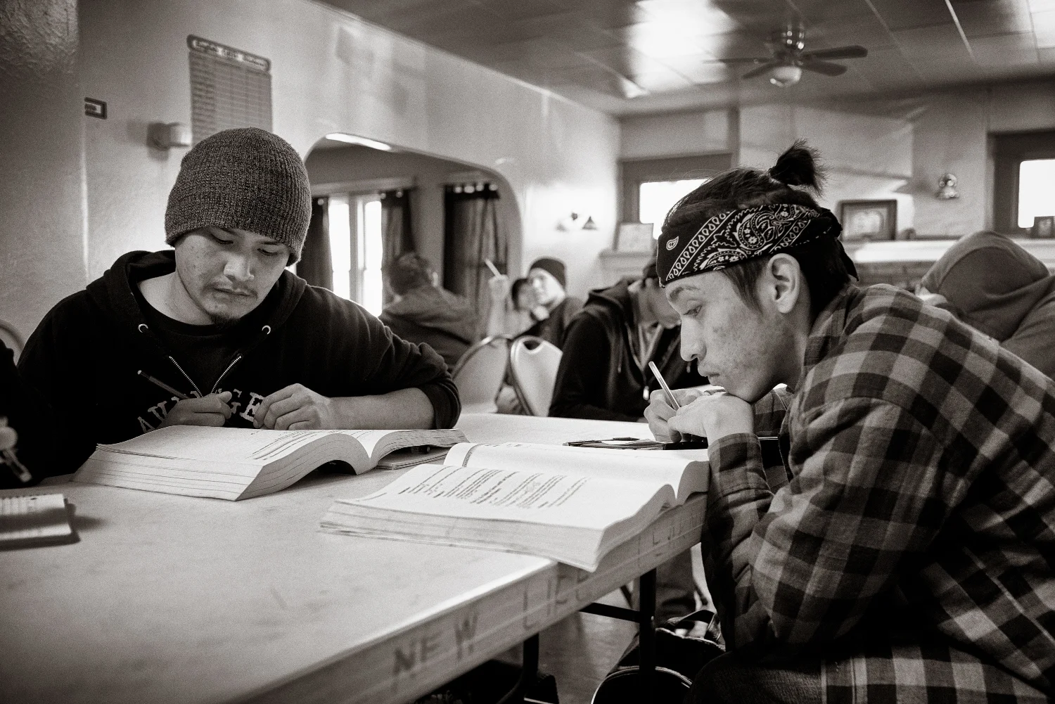 Gary Lee and Dazhavek Gould study. Don Usner / Searchlight New Mexico.