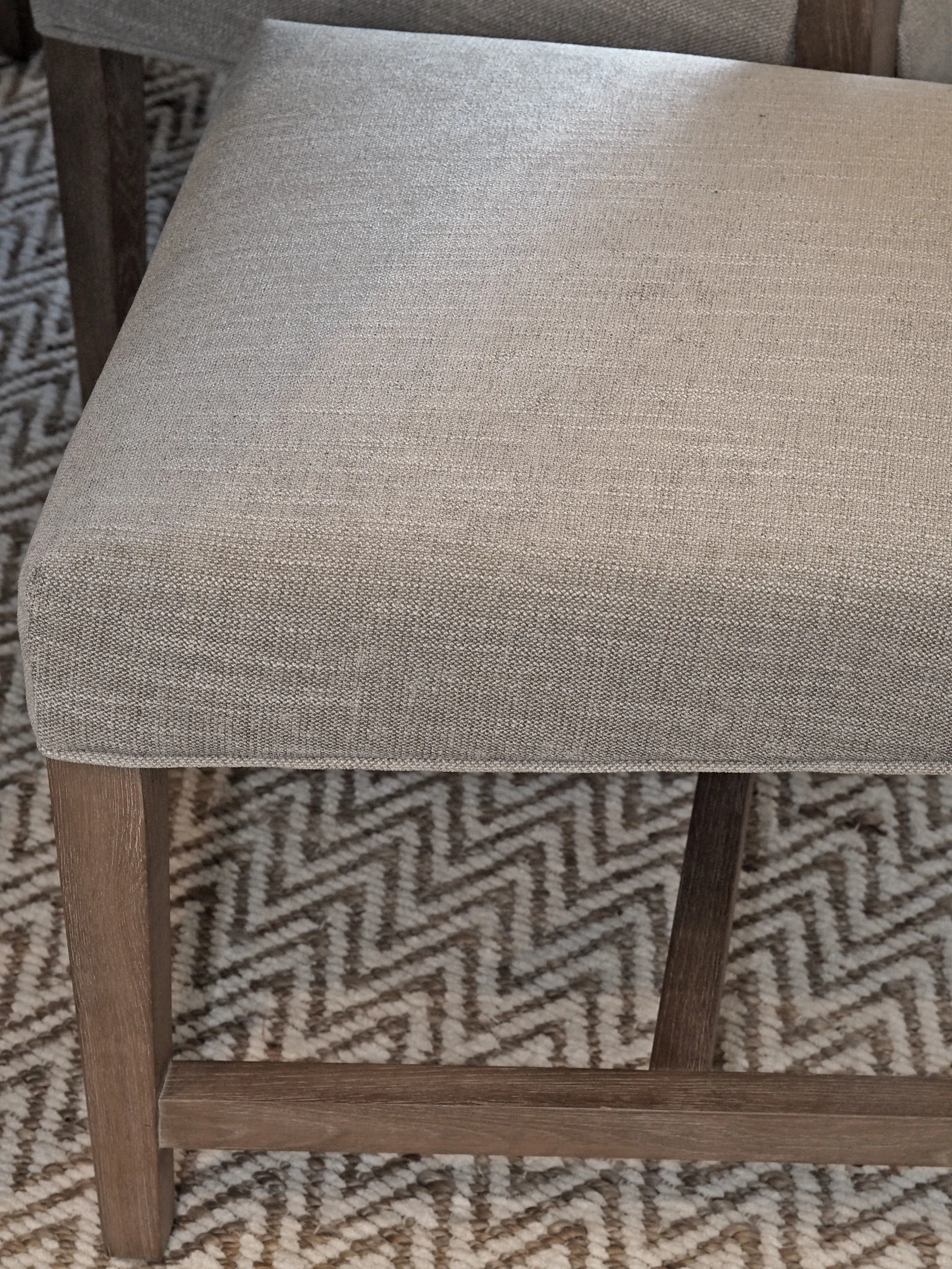 Pottery Barn Ashton Non-Tufted Dining Chairs in Silver Taupe. Showing the fabric and wood detail up-close. Honestly, these chairs are well worth the price! Incredibly sturdy and comfortable! 