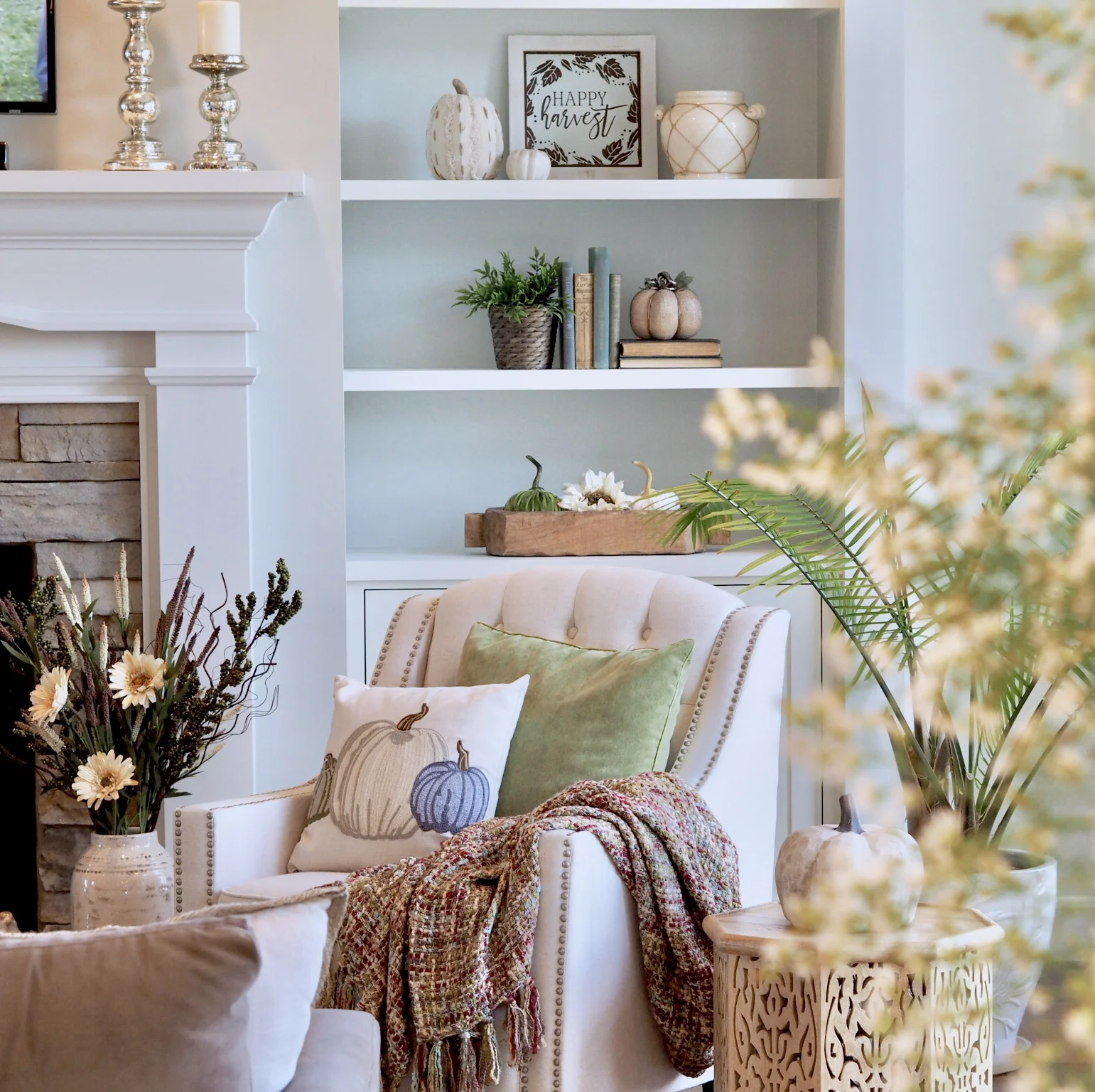 Happy Harvest sign and throw were found at Home Goods. Chair is from Lamps Plus and the pillows are from Pier 1 Imports.
