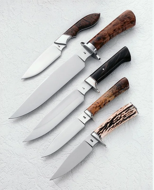 These are the five knives I used to pass my American Bladesmith Society Journeyman Smith test. The knives are submitted to a panel of six judges who critique the overall appearance, fit, and finish of the knives to determine if the quality of the maker's work is up to a standard expected by the ABS.