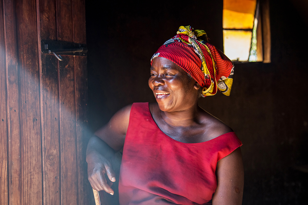  Lucia Mudima (51), a widow with 4 children, at her marital home in the Mandeya area of Honde Valley in the Eastern Highlands of Zimbabwe. Lucia buys unripe bananas, avocados and sugarcane from small holder farmers in her community which she then rip