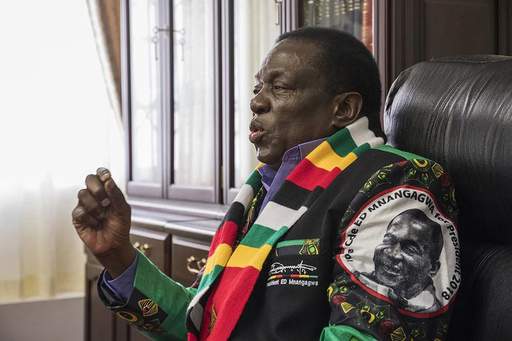 June 9, 2018: Zimbabwe President Emmerson Mnangagwa, wearing a blazer bearing his campaign promises, speaks to The Wall Street Journal weeks before landmark national elections. - For The Wall Street Journal
