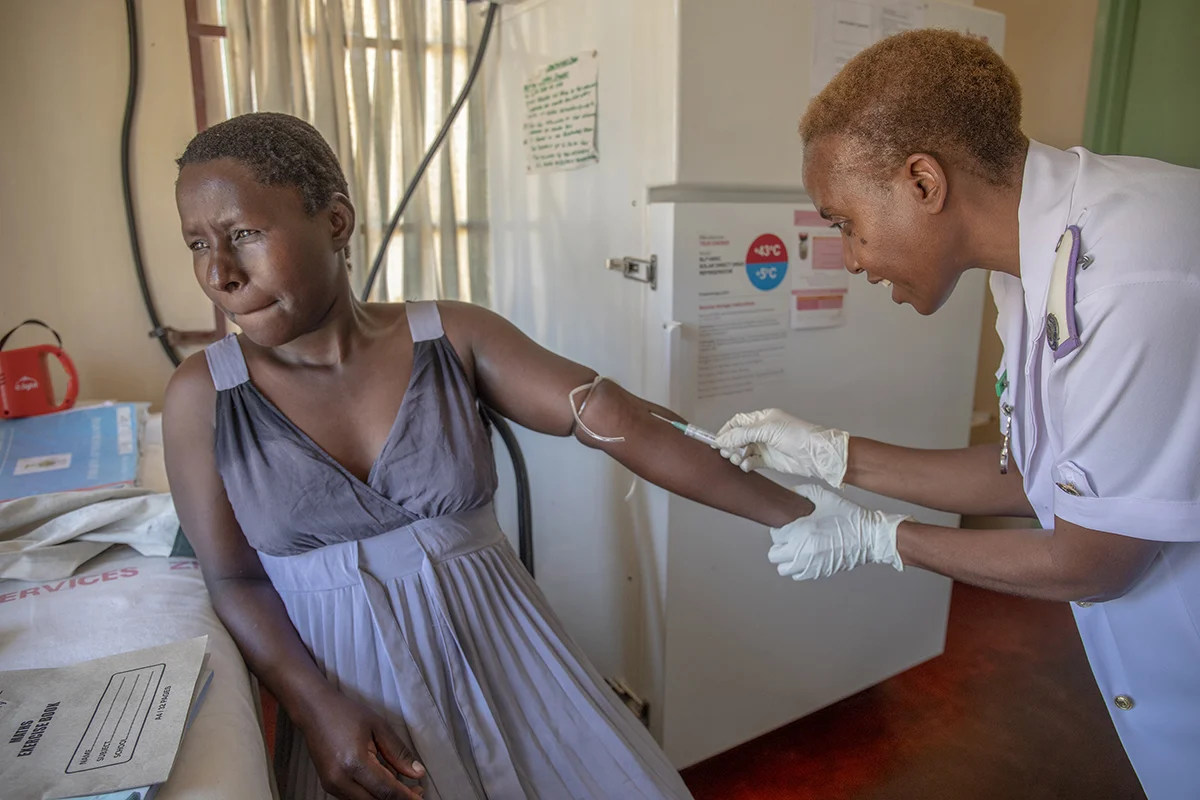 October 17, 2018: Nurse Mhepo draws blood from a from a pregnant client at Jari Clinic in Chirau, in Zvimba district. - For Crown Agents