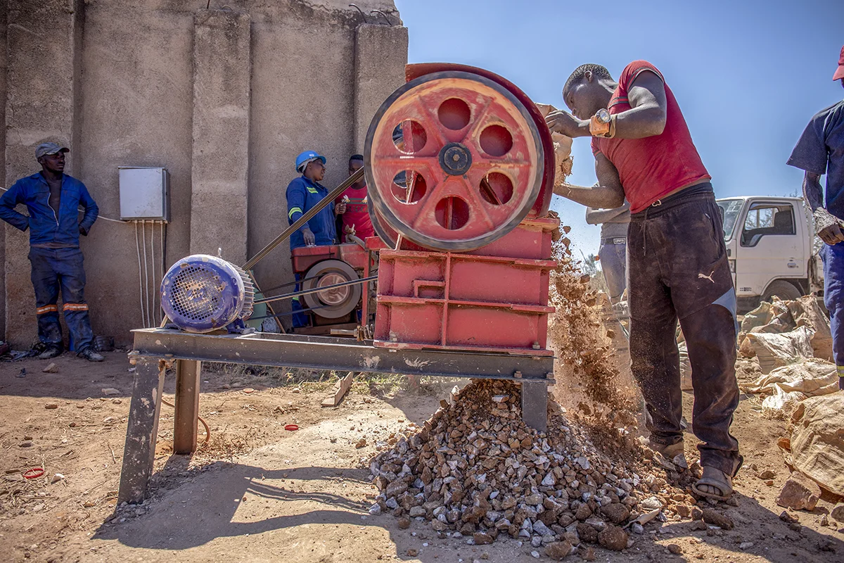 November 10, 2018: An artisanal miner crushes ore using a crusher at Ngaka, Umguza district in Matabeleland North province 484 kms from Zimbabwe’s capital city, Harare. The crusher reduces the ore to 50mm stones ready for the next processing stage. According to Zimbabwe National Statistics, mining accounts for 50% of the country’s forex earnings. - For Bloomberg