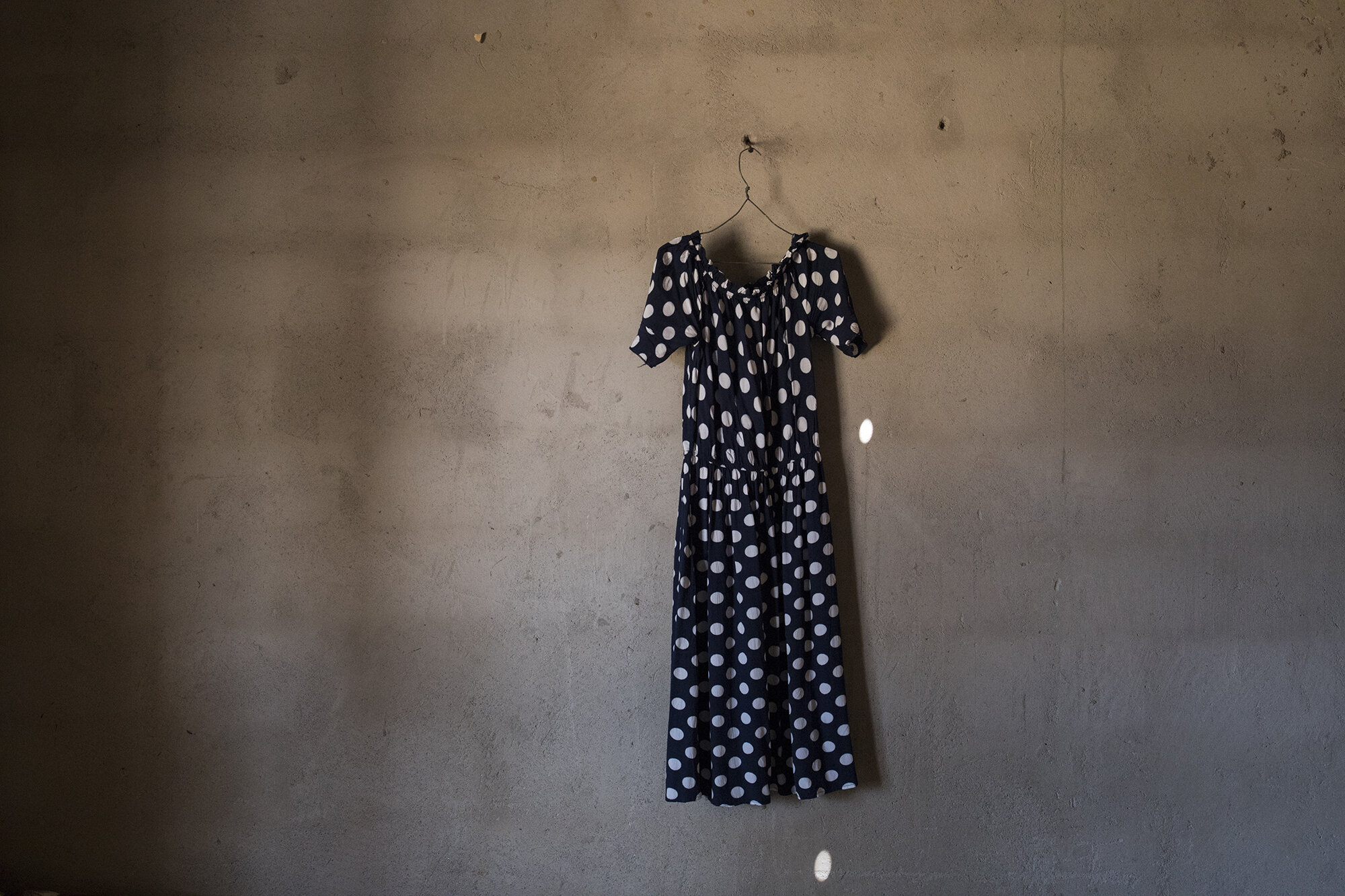  “After working in South Africa I only managed to buy myself a dress before I lost my job and had to return home. That is the dress I came back with. It reminds me the importance of getting an education. If you get an education, you can get a good jo