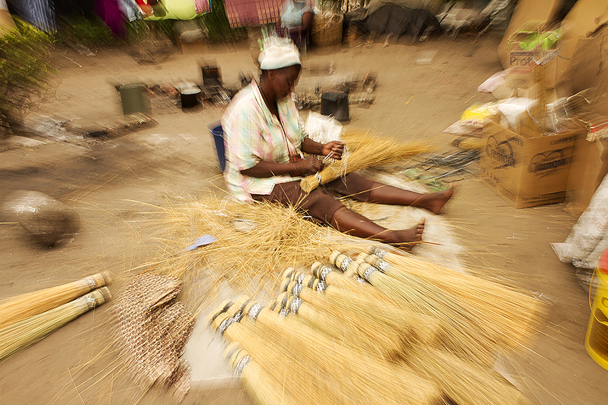  December 1, 2014: “Poverty taught me how to make sweeping brooms. When baskets were no longer profitable in the 90s in Harare, I learnt how to make sweeping brooms to survive.” Gogo Mpofu (69), a street vendor in Harare, who took her two married son