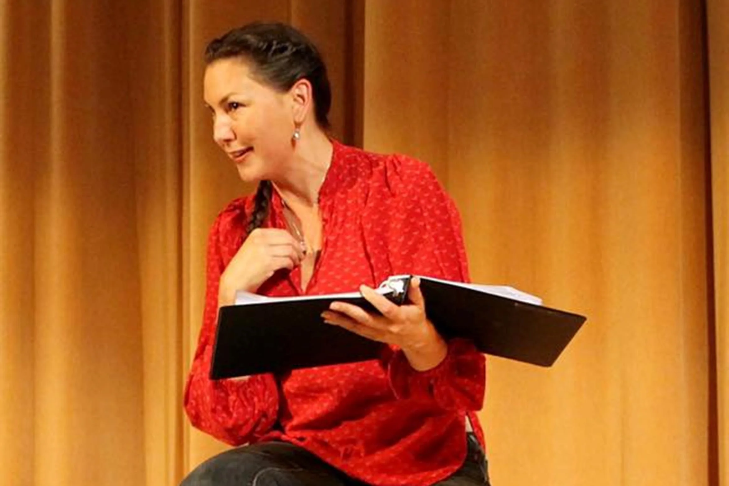 DeLanna performing a selected reading from And So We Walked as part of the Native American Theatre Project in July 2016.
