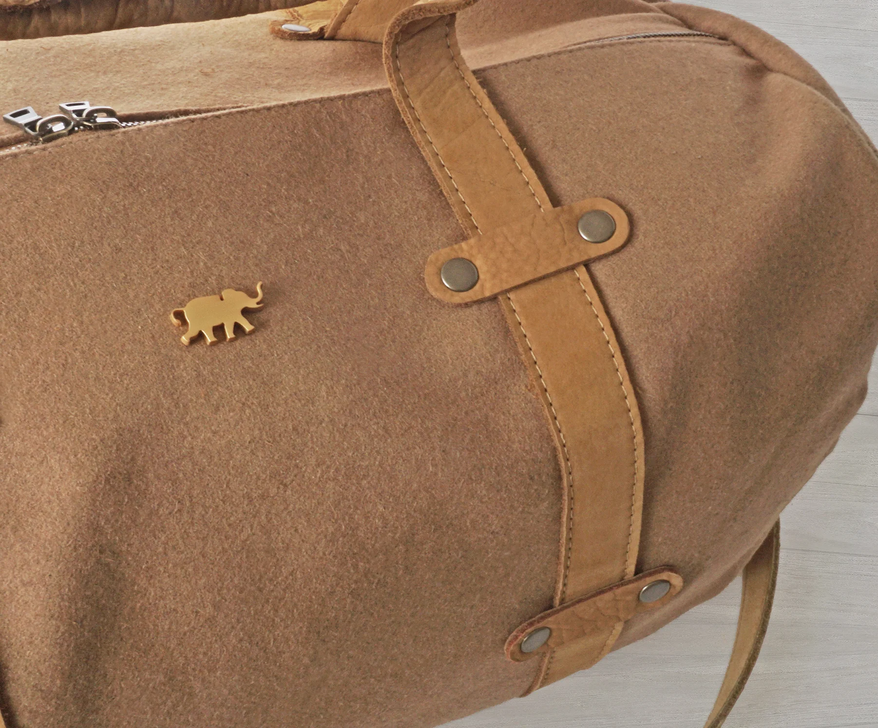 VIRGIN CANADIAN MELTON WOOL, HANDBAG-GRADE LEATHER FROM NAPA CA. LASER-CUT "HERMY" BADGE (STAINLESS STEEL WITH 24c GOLD PLATING)