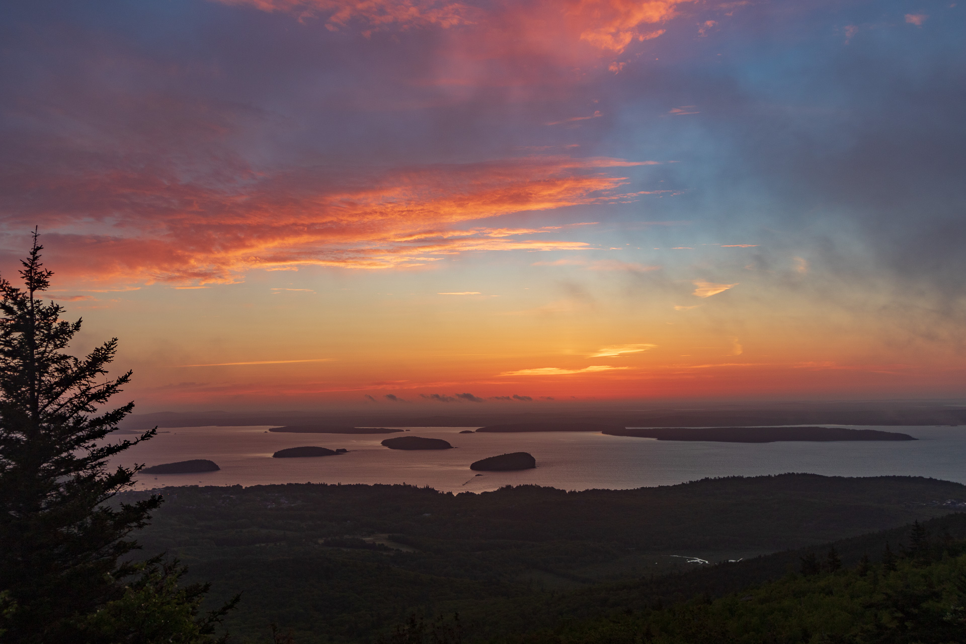  Sunrise up on Cadillac Mountain in Acadia National Park.  We tried going to the summit for sunrise but it was heavily blanketed in fog.  We came down a portion of the way and took shots as the fog rolled in. 