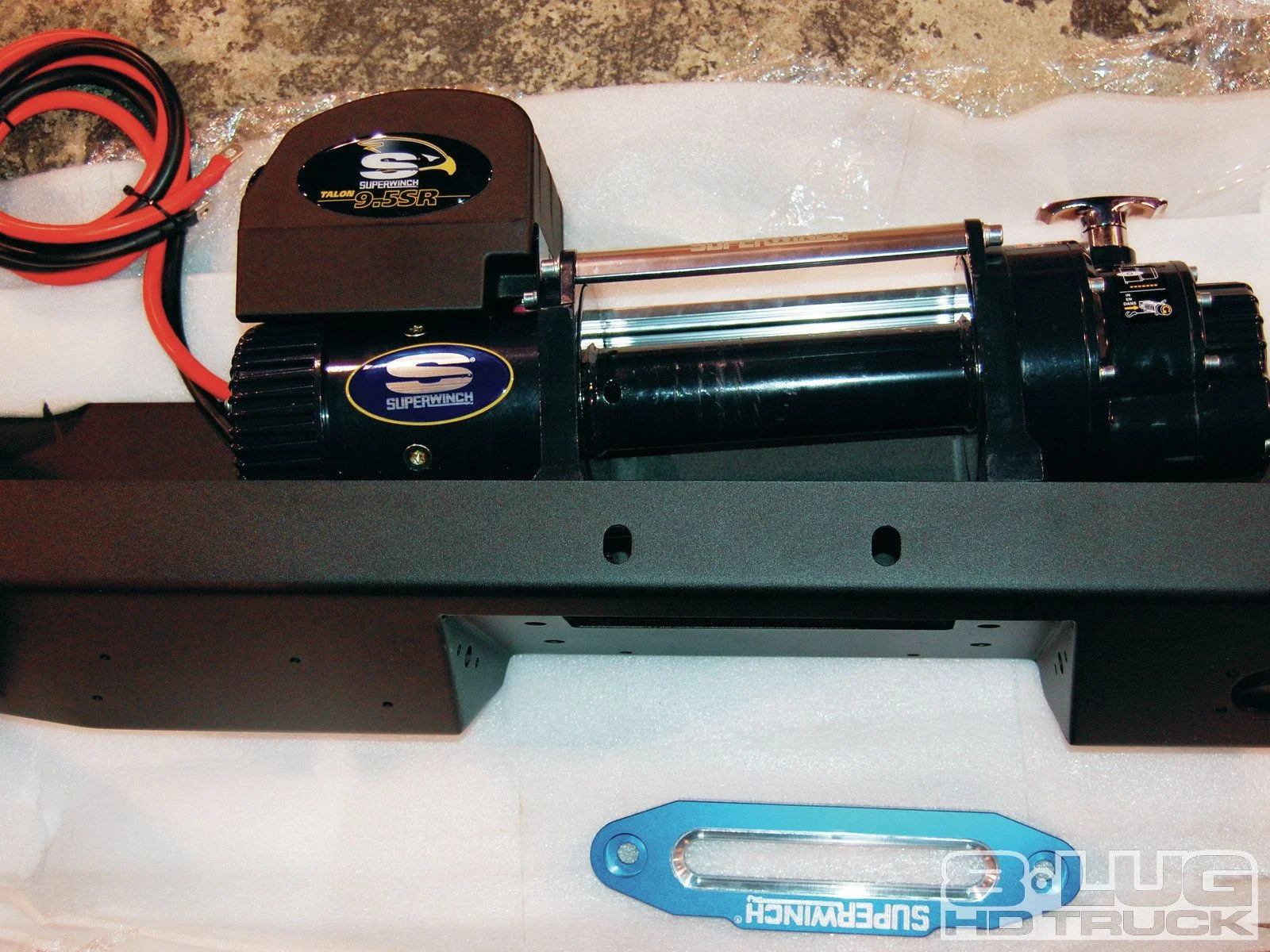 1210-8l-26+winch-time-ultimate-tow-and-work-truck-upgrades+talon-fitted-to-bumper.jpg