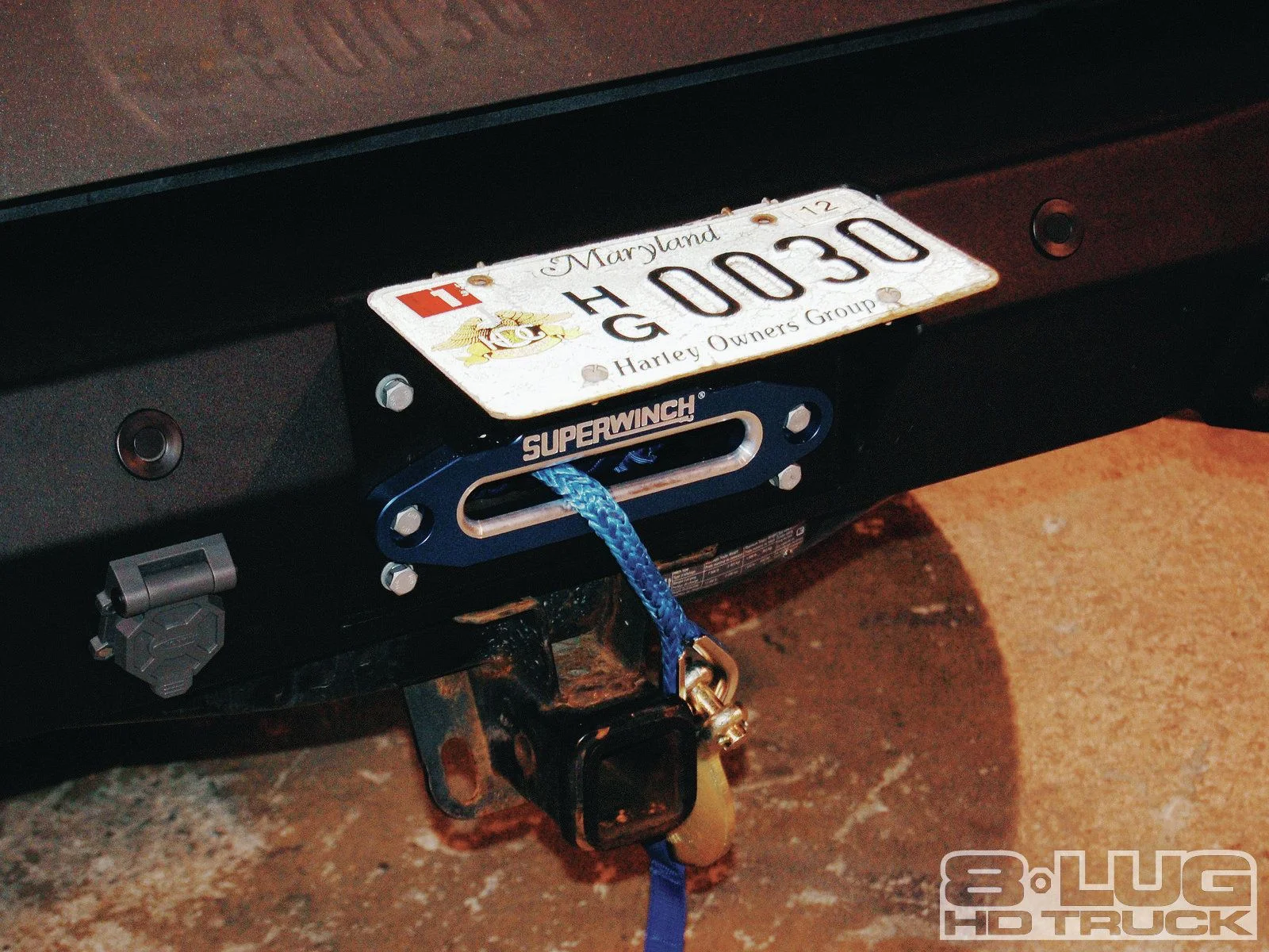 1210-8l-33+winch-time-ultimate-tow-and-work-truck-upgrades+mount-rear-license-plate.jpg