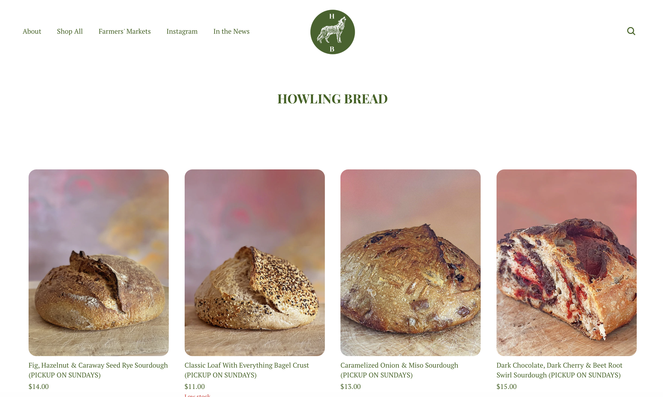 Four different types of sourdough bread on a website, labeled as Fig. Hazelnut & Caraway Seed Rye Sourdough, Classic Loaf With Everything Bagel Crust, Caramelized Onion & Miso Sourdough, and Dark Chocolate, Dark Cherry & Beet Root Swirl Sourdough, wi