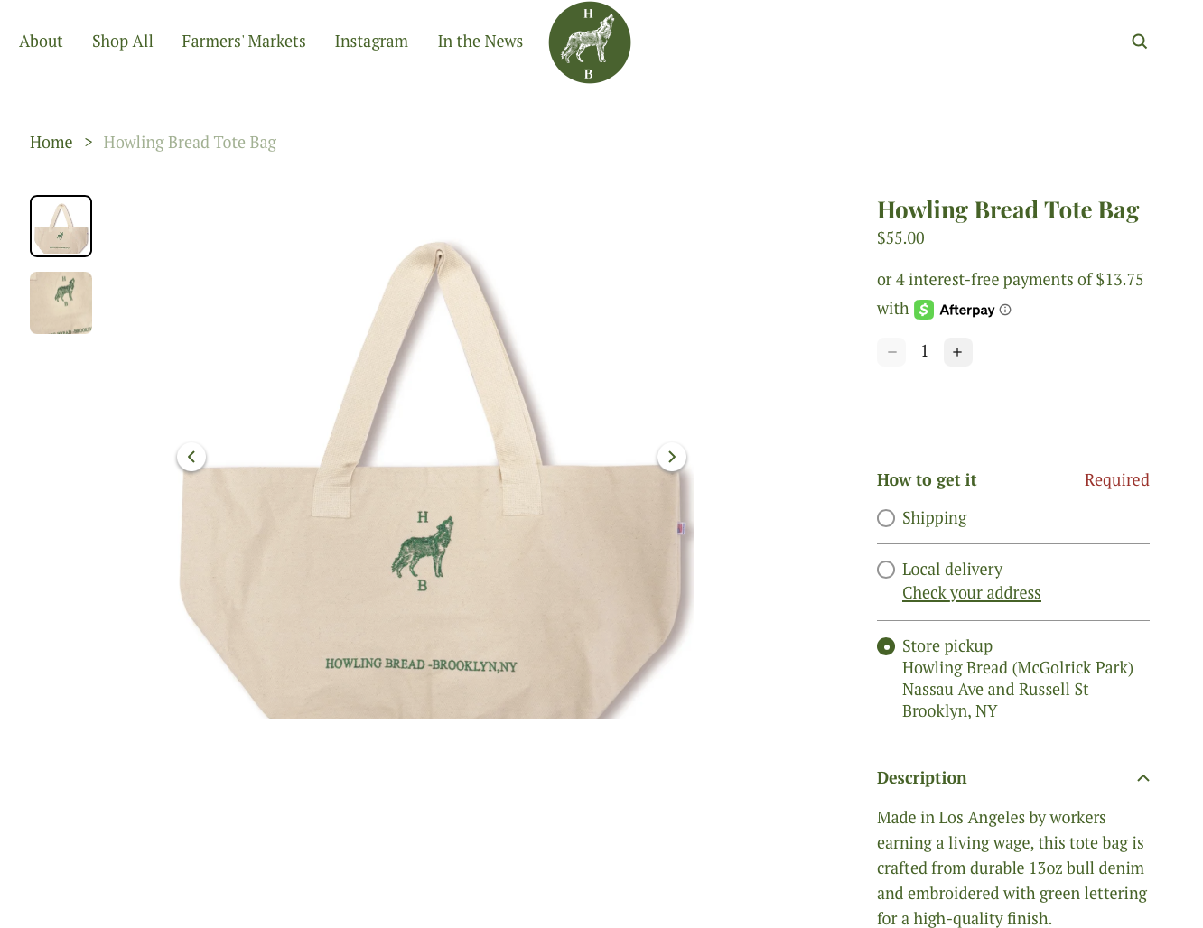 A beige canvas tote bag with green embroidery of a dog and letters H and B, and text "Howling Bread Brooklyn, NY" on the front