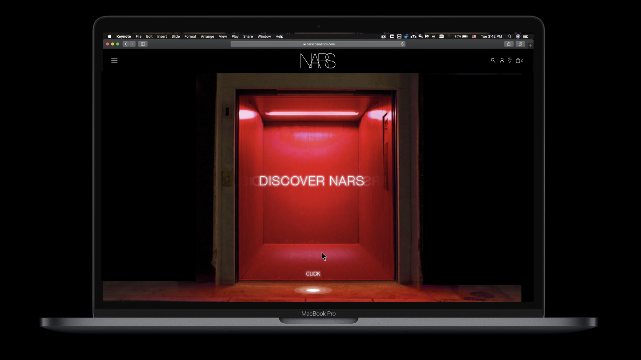 Laptop screen displaying the NARS cosmetics website with a prominent red lift door, illuminated with neon lights, and the text 'DISCOVER NARS' in front of the door.