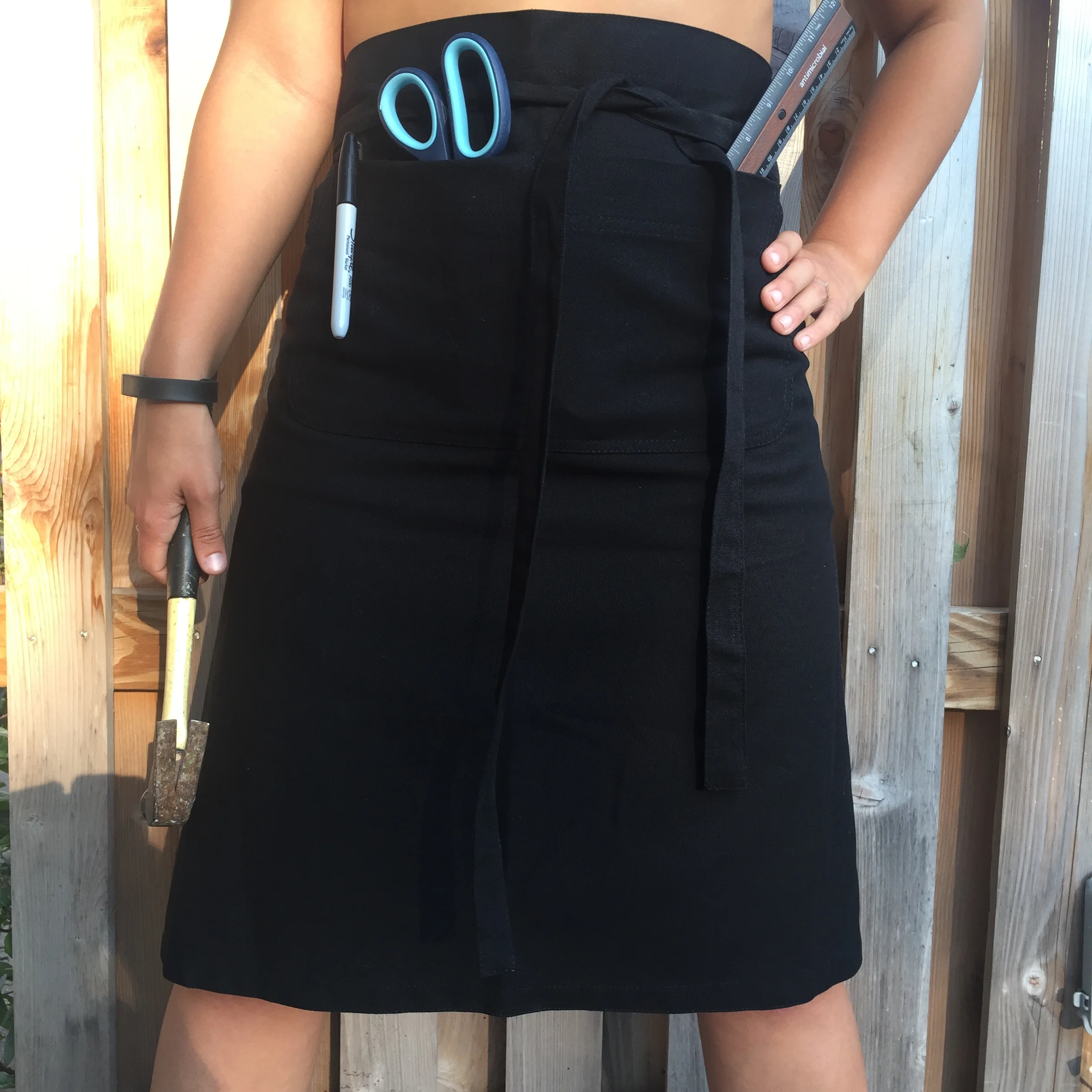 APRONS IN A VARIETY OF COLORS AND STYLES IN COTTON AND DENIM