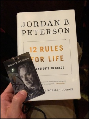 My copy of “12 Rules for Life” and the VIP pass.
