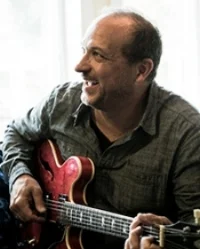 Boutique-Creative-portrait-Russ-guitar-desaturated.jpg