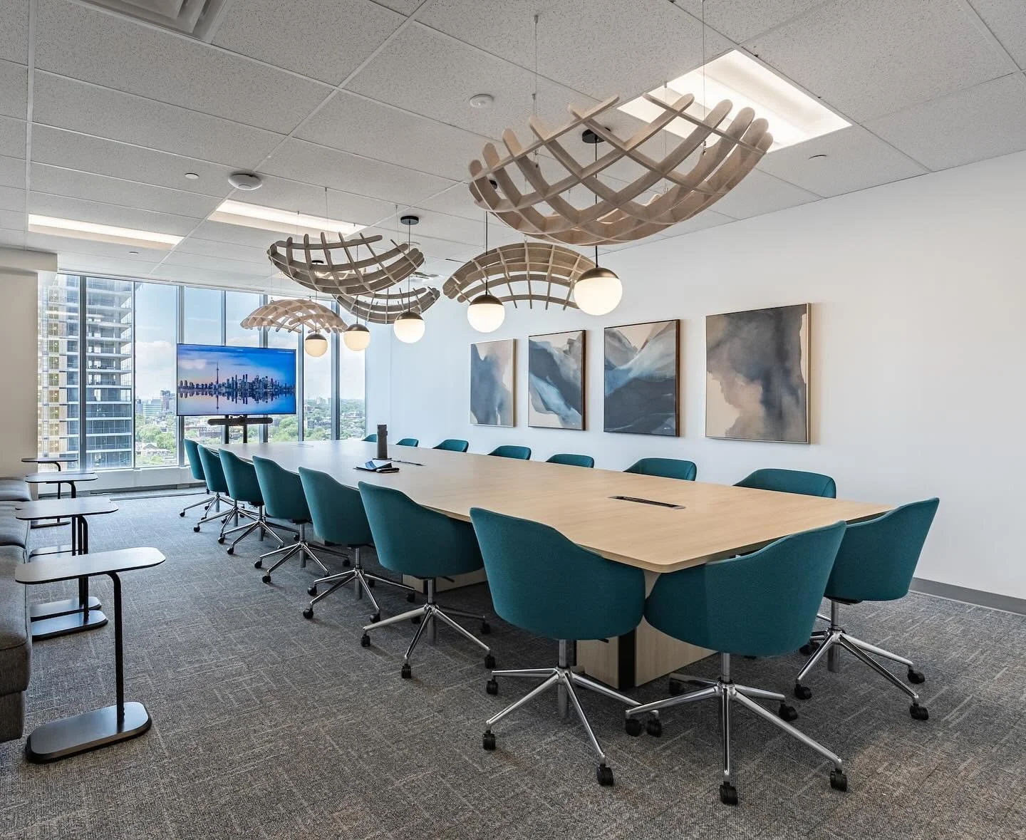 Deep Genomics wanted to turn what used to be a multi-person office into their new boardroom, and since this room was visible from the elevator vestibule it demanded a little extra pizazz. We used acoustic baffles and new lighting to create visual int