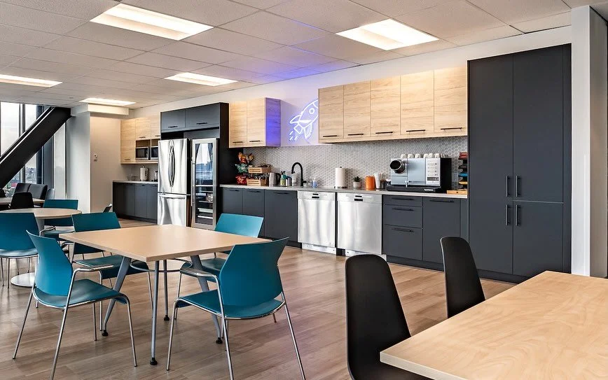 Deep Genomics had existing dining furniture, but no true kitchen/cafeteria. We drew from their palette and branding to create a proper plumbed kitchen that brings people&mdash;and the space&mdash;together. 
➡️ to see the before pic.