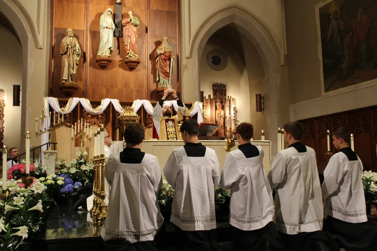 Altar servers participating in Mass at St. Joseph