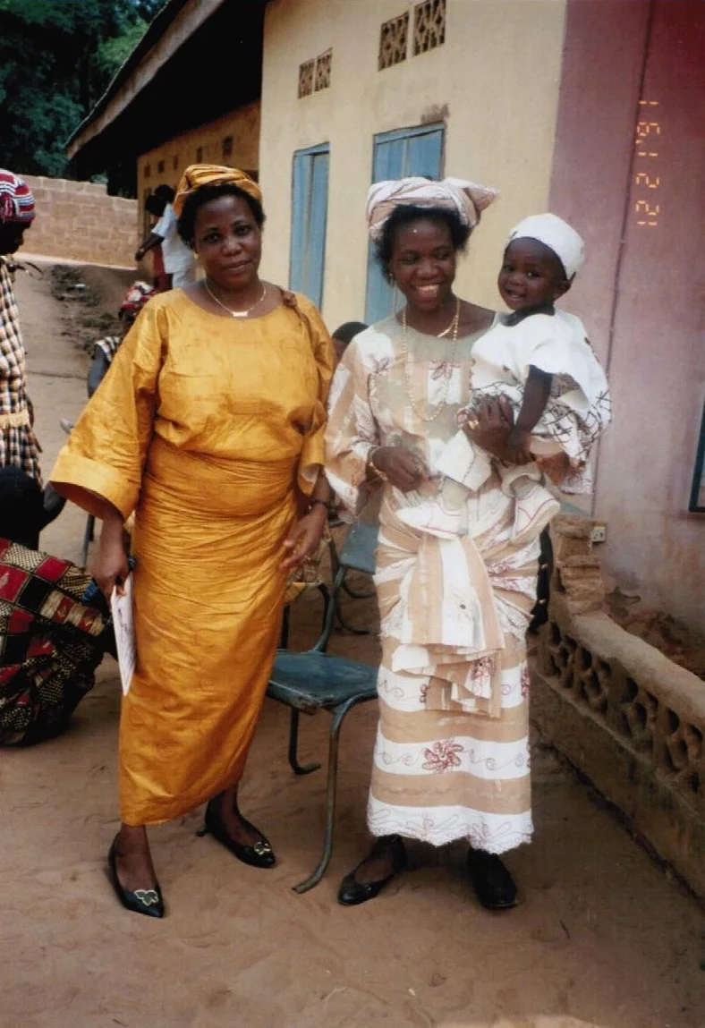 A trip to my mom's compound in Etiti, Imo State, 5 days before my 1st birthday. The side eye with a smile is my mom's forte. To the left is my mom's older sister, Aunty Chi. 