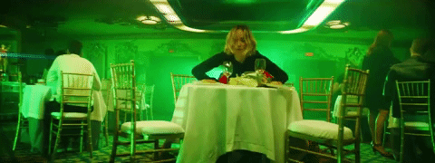 Olivia Wilde doing what I wish I could do when I'm served kale. 