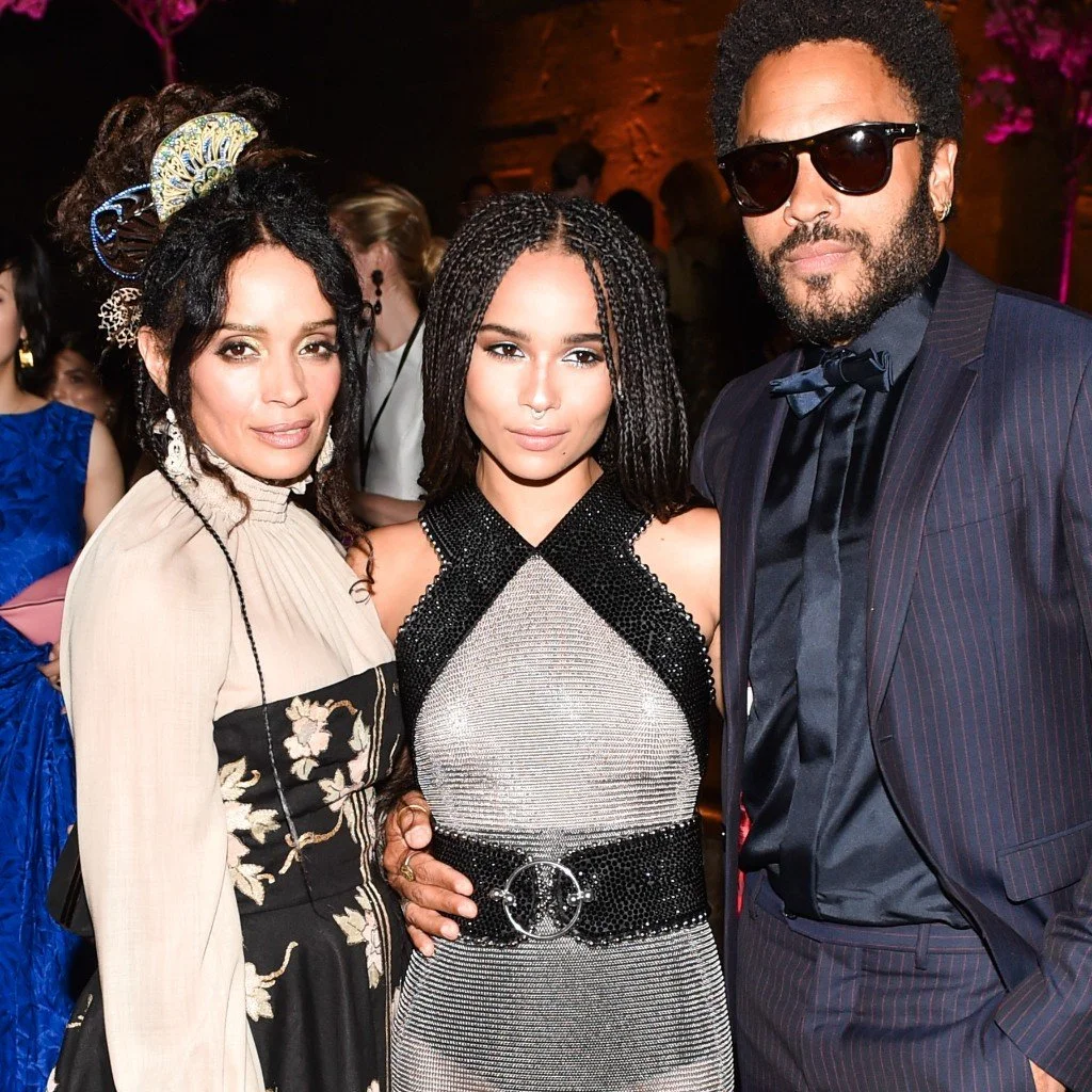 Zoe Kravitz (middle) posing with her mother (Lisa Bonét), father (Lenny Kravitz), and cheekbones (custom made on Mount Olympus). 