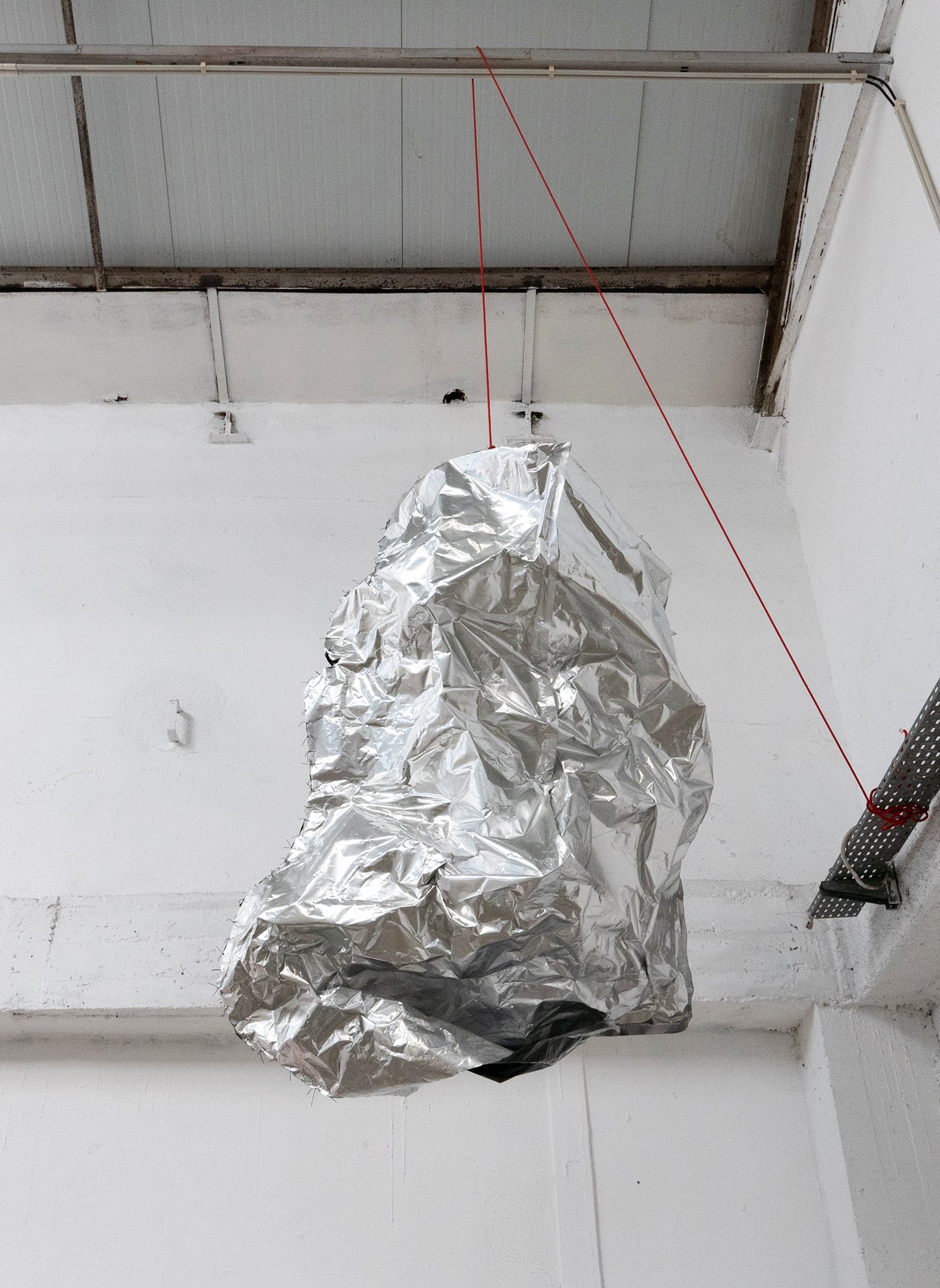   Her Temple of ID II   2023  Aluminium sheet, string and rope  Approx. 160 x 95 cm in dim.      