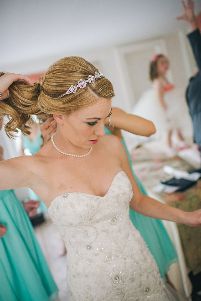 NH Wedding Photographer: bride fixing hair