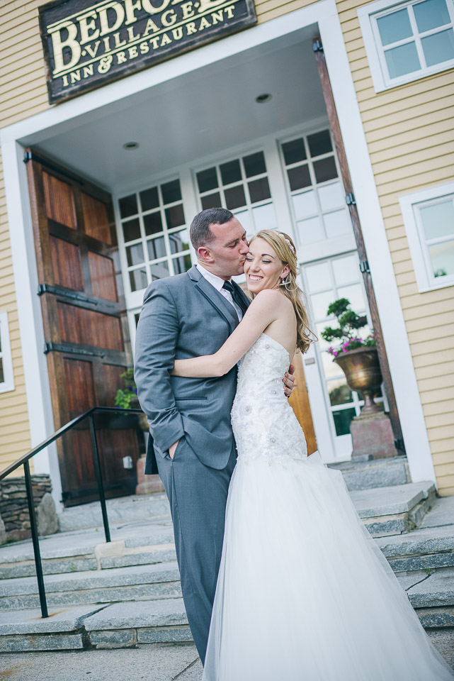 NH Wedding Photographer: in front on granite steps