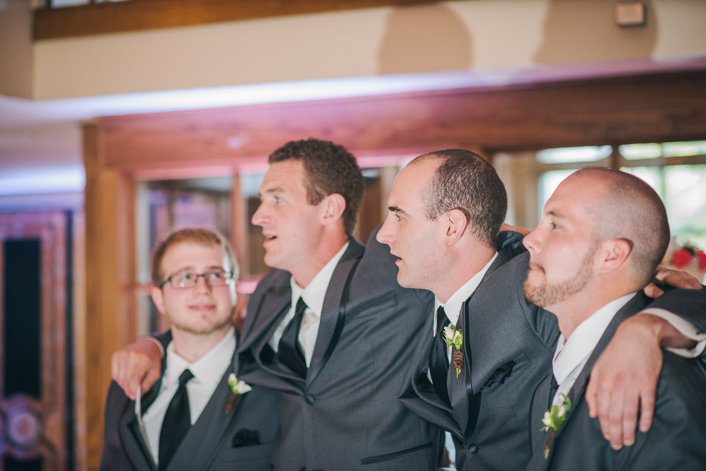 NH Wedding Photographer: groomsmen watching first dance