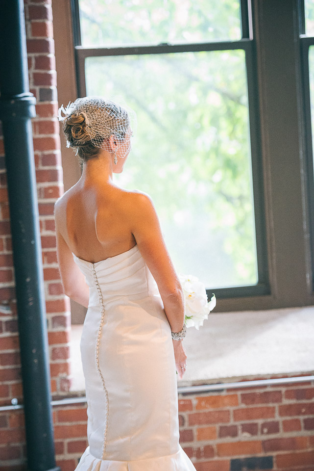 NH Wedding Photographer: bride looking out window