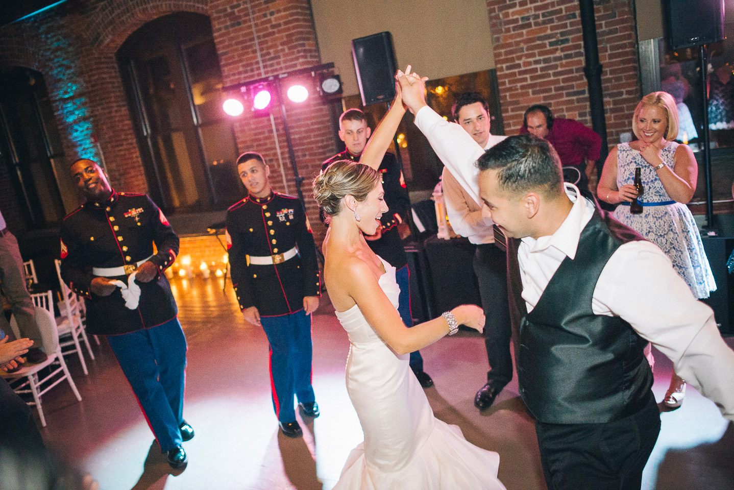 NH Wedding Photographer: bride and groom dancing 