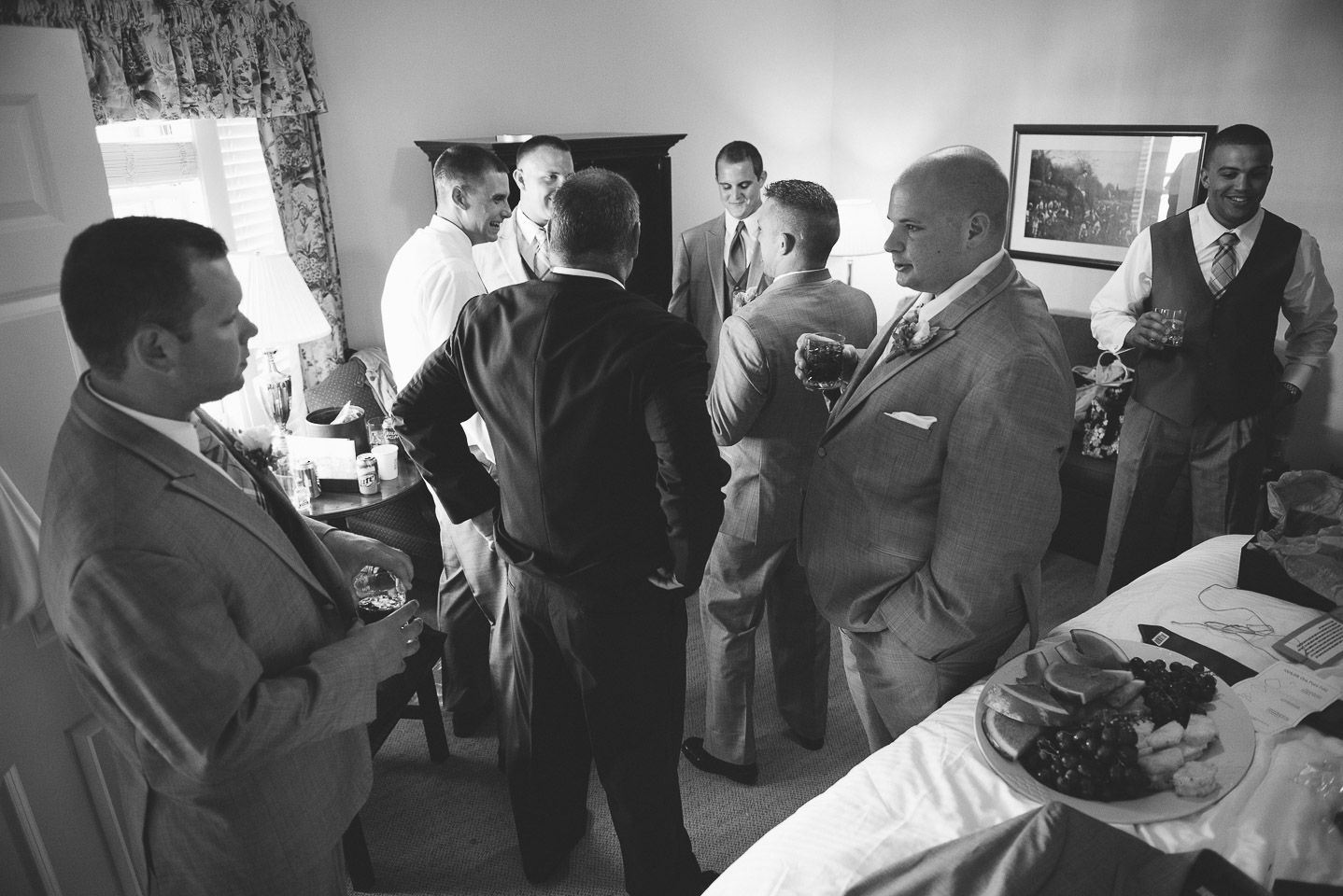 NH Wedding Photographer: groom talking getting ready