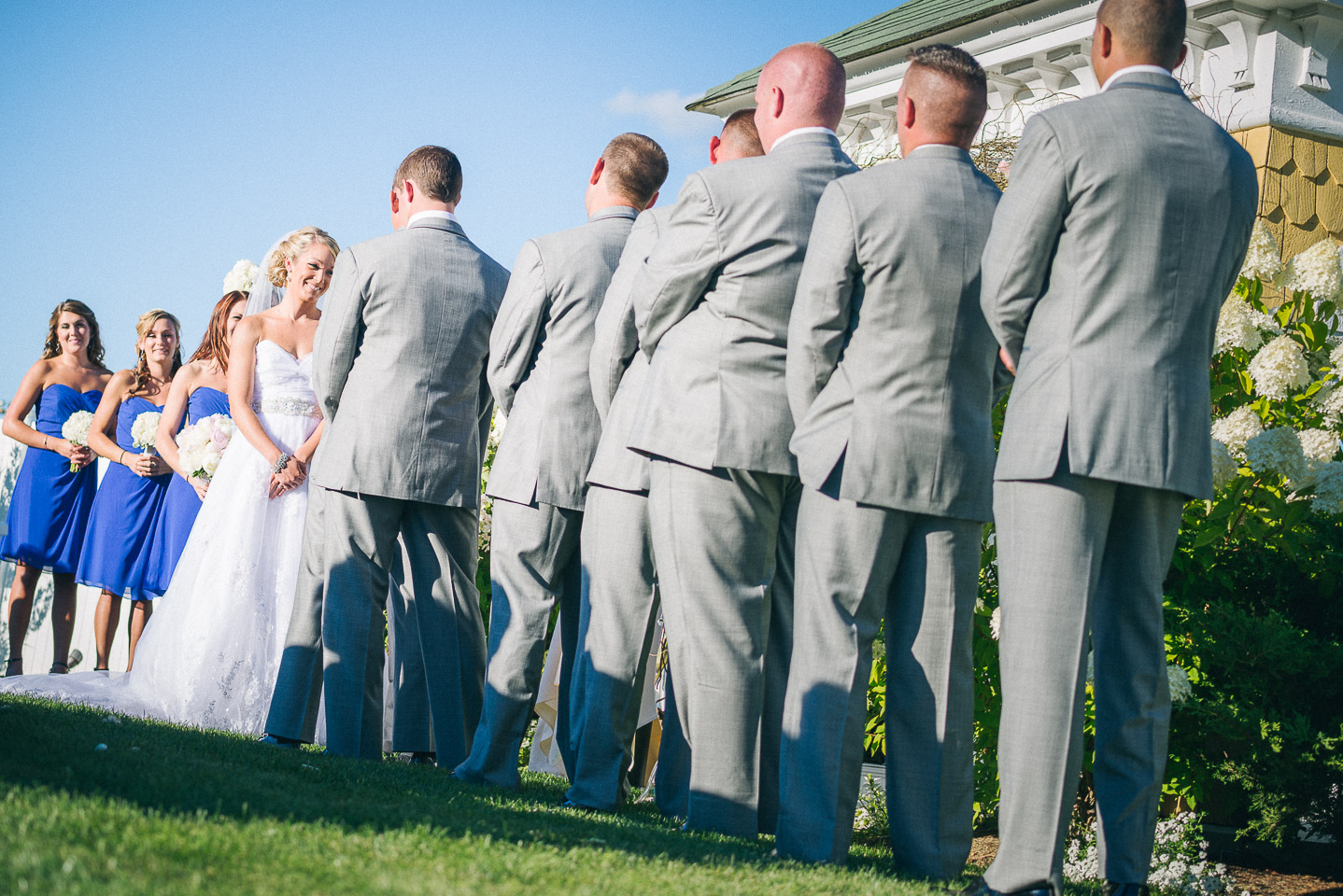 NH Wedding Photographer: wide angle of bridal party at ceremony