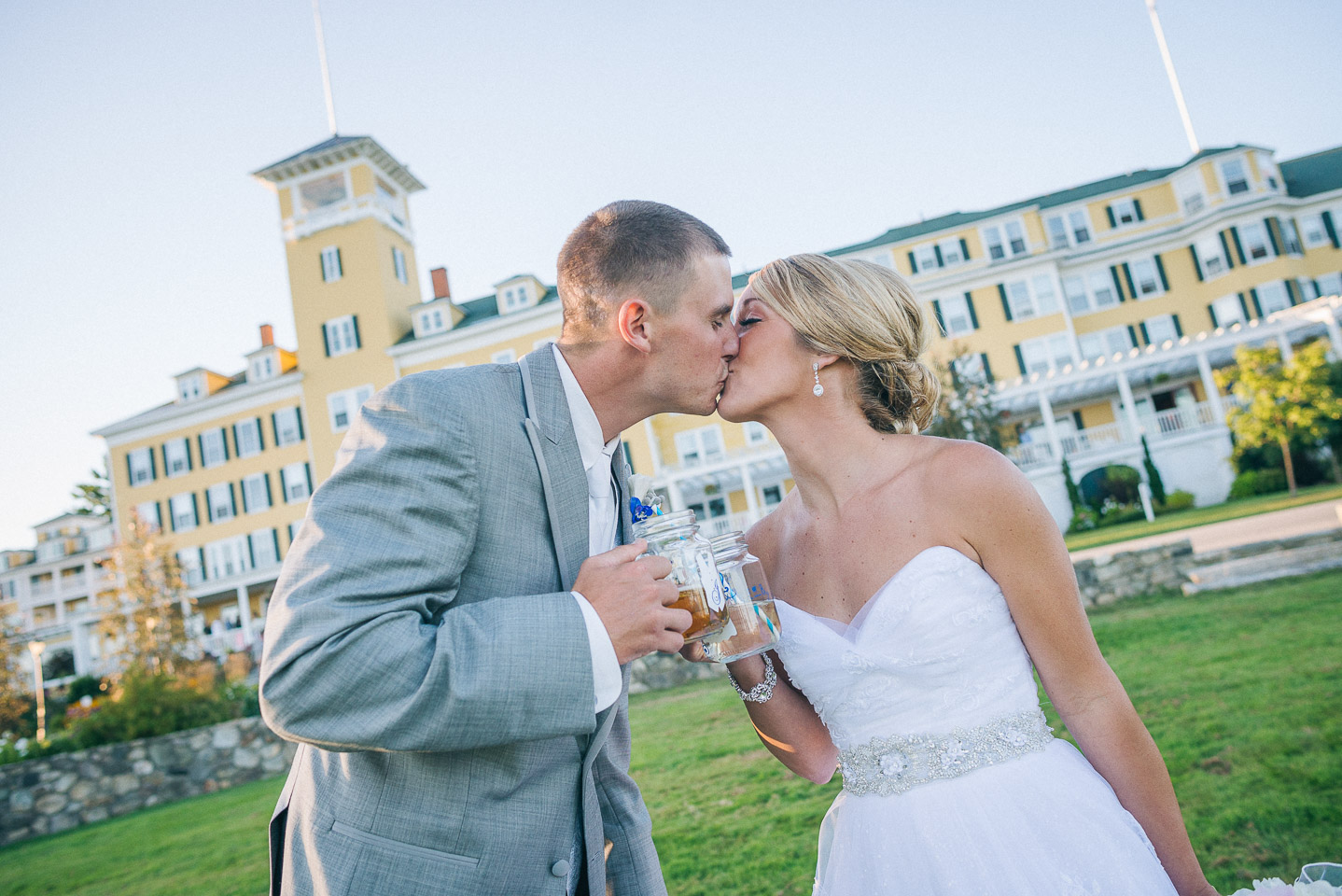 NH Wedding Photographer: bride and groom in front of Mountain View Grand