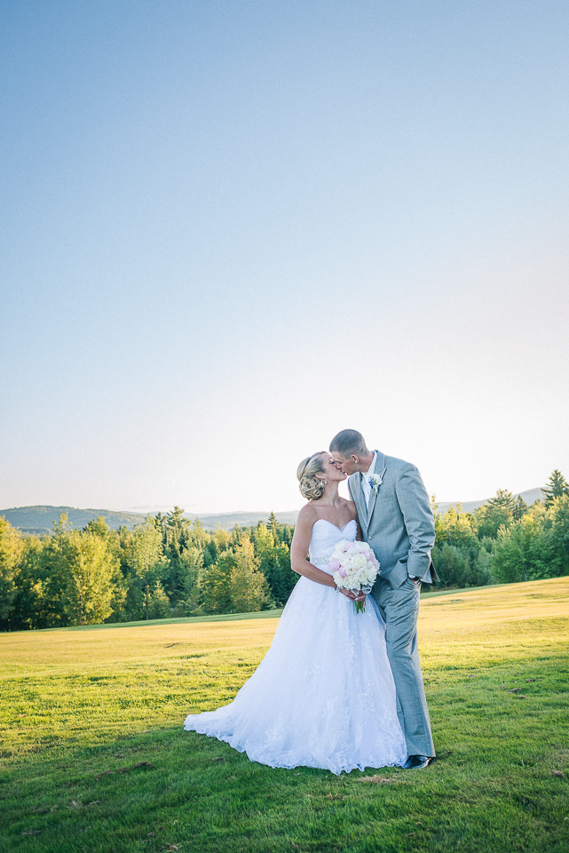 NH Wedding Photographer: newlyweds kissing