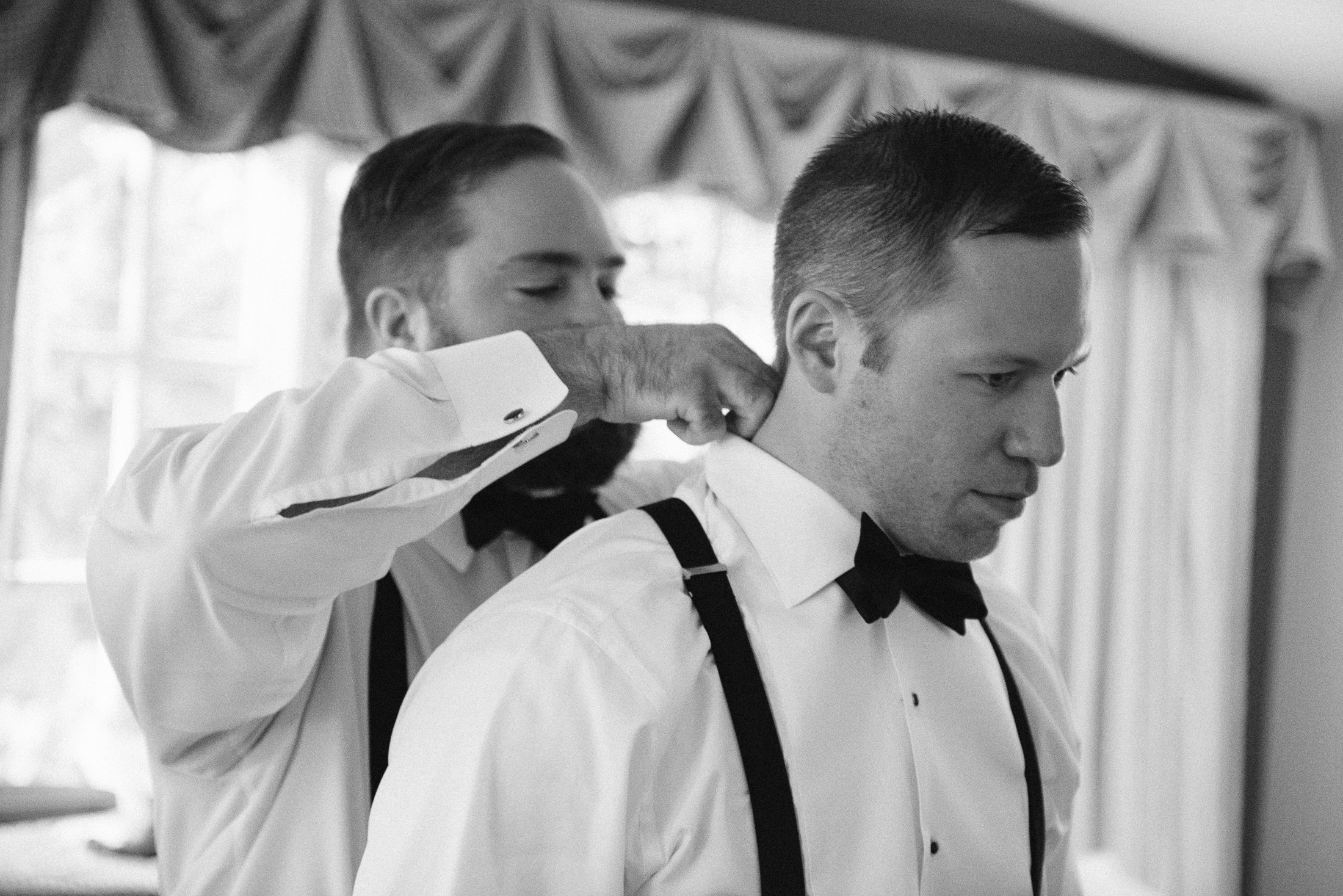 NH Wedding Photographer: groom getting ready at BVI