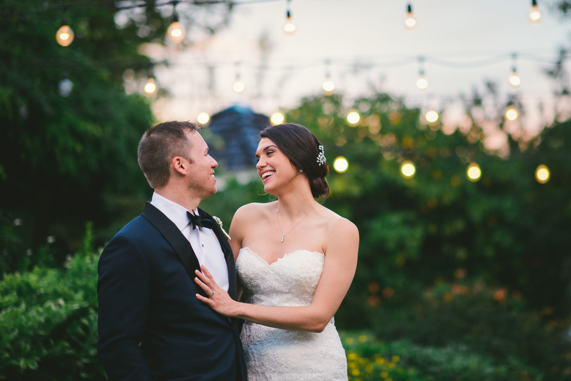 NH Wedding Photographer: couple under lights