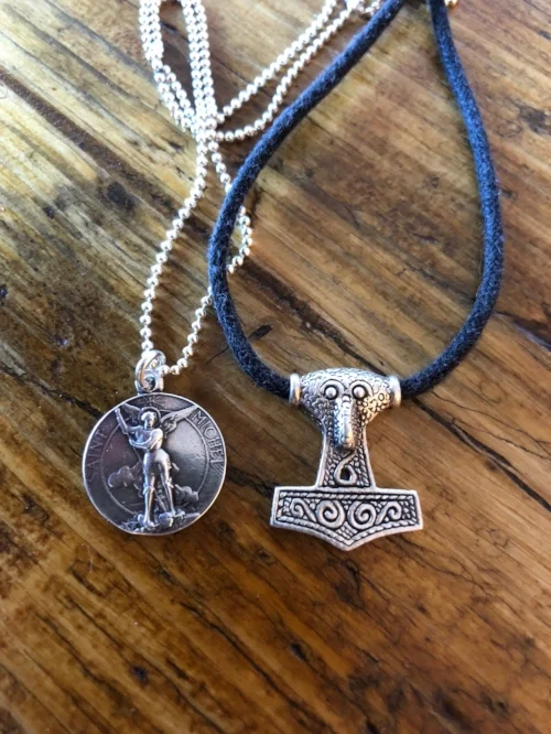 5. Archangel Michael Pendant by Rosa Mystica on Etsy / Thor Hammer Pendant (Sorry no link to the Thor Hammer - I picked it up at a Viking market during Glasgow's summer festival.)