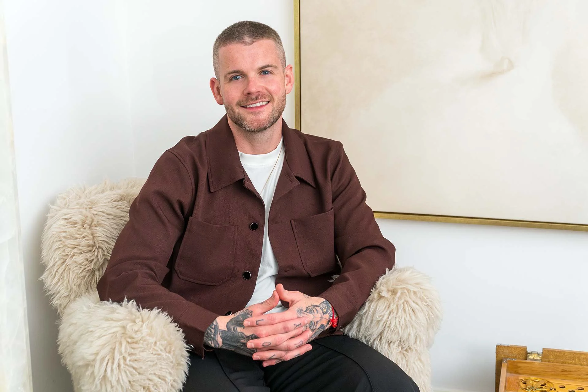 A photograph of Kyle Gray smiling towards the camera