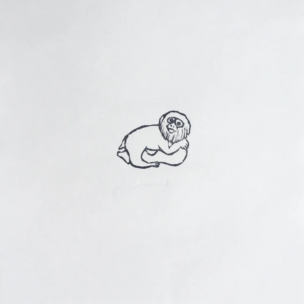 Netsuke - Ape Clutching a Gourd
