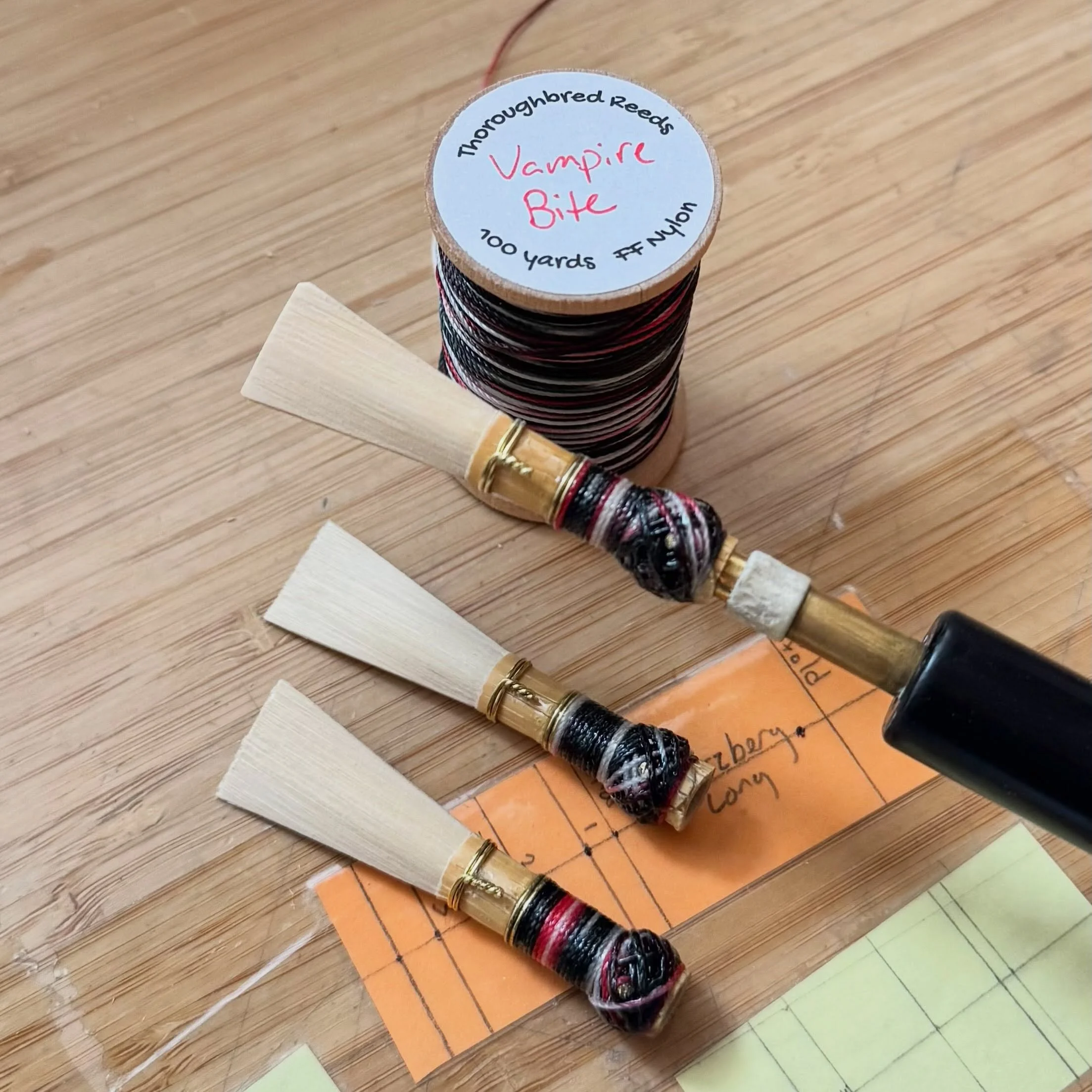 Vampire bite? Team Cullen, obviously. Some amazing hand-dyed thread by Alexis over at @thoroughbredreeds #TeamCullen #Bassoon #BassoonReeds #Reedmaking #DoubleReed