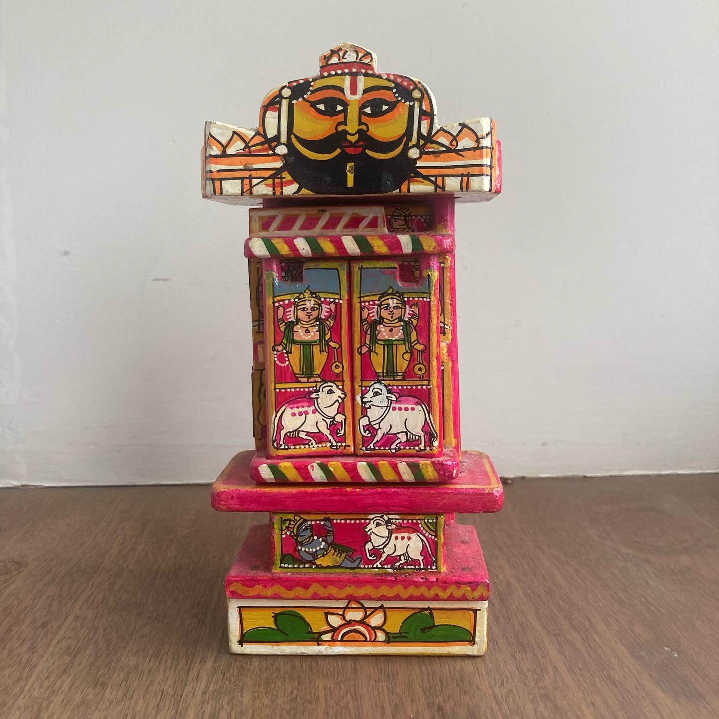 I love these wooden, hand-painted, mobile Kavad shrines. Can anyone share any insights into the stories being told?