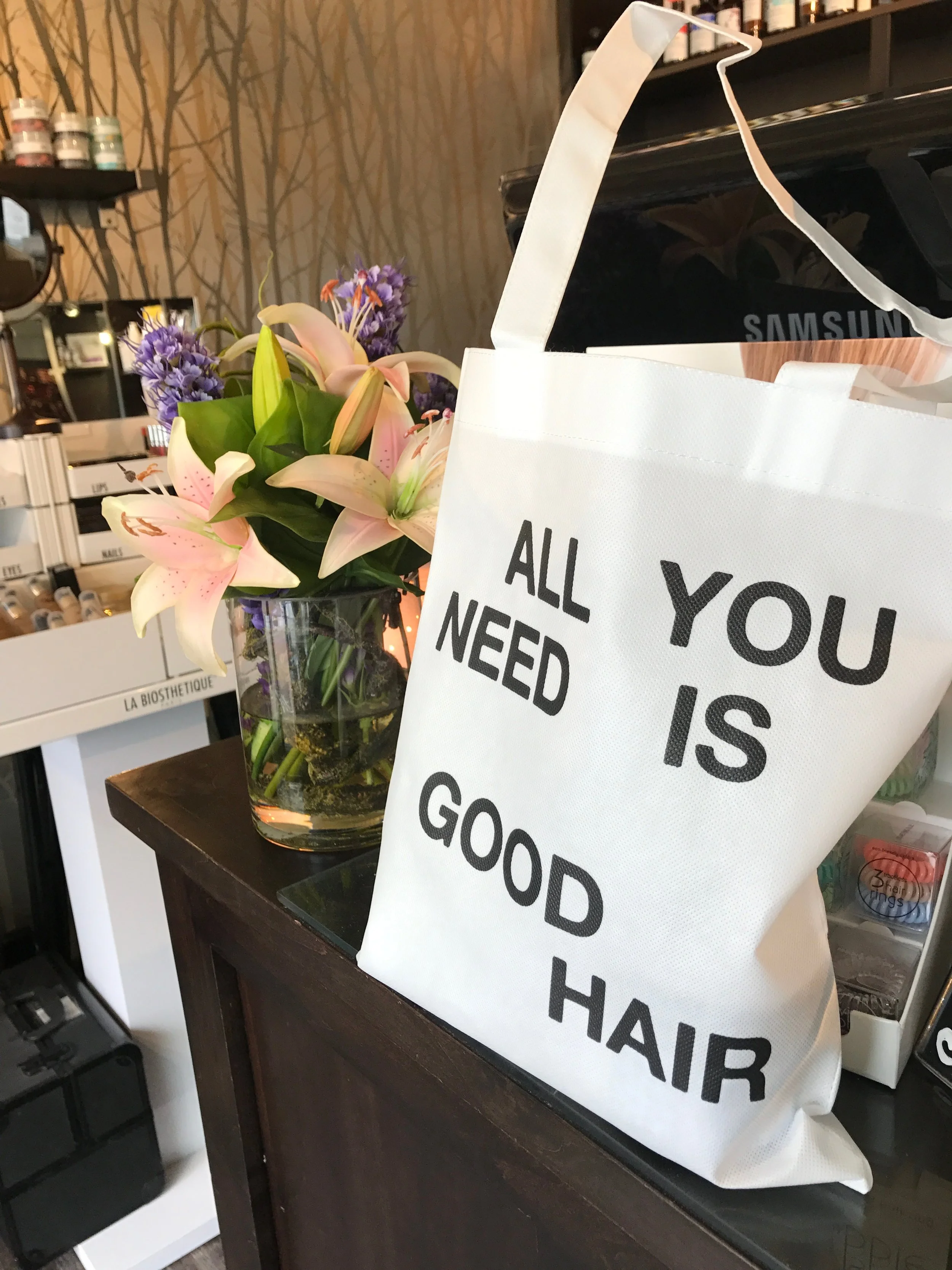 My new, cute sustainable product bag from R+Co .