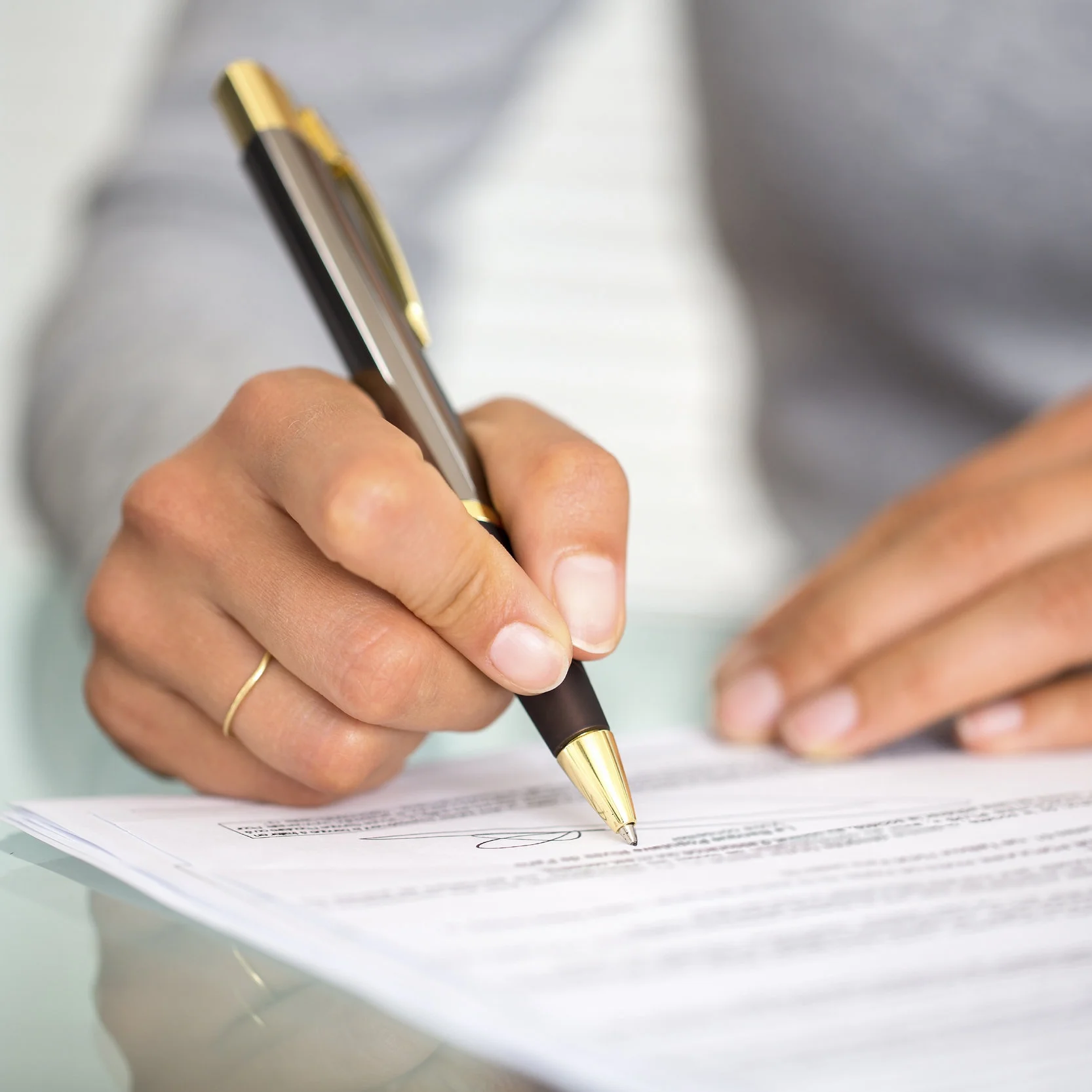 Signing-contract-pen-hand.jpg