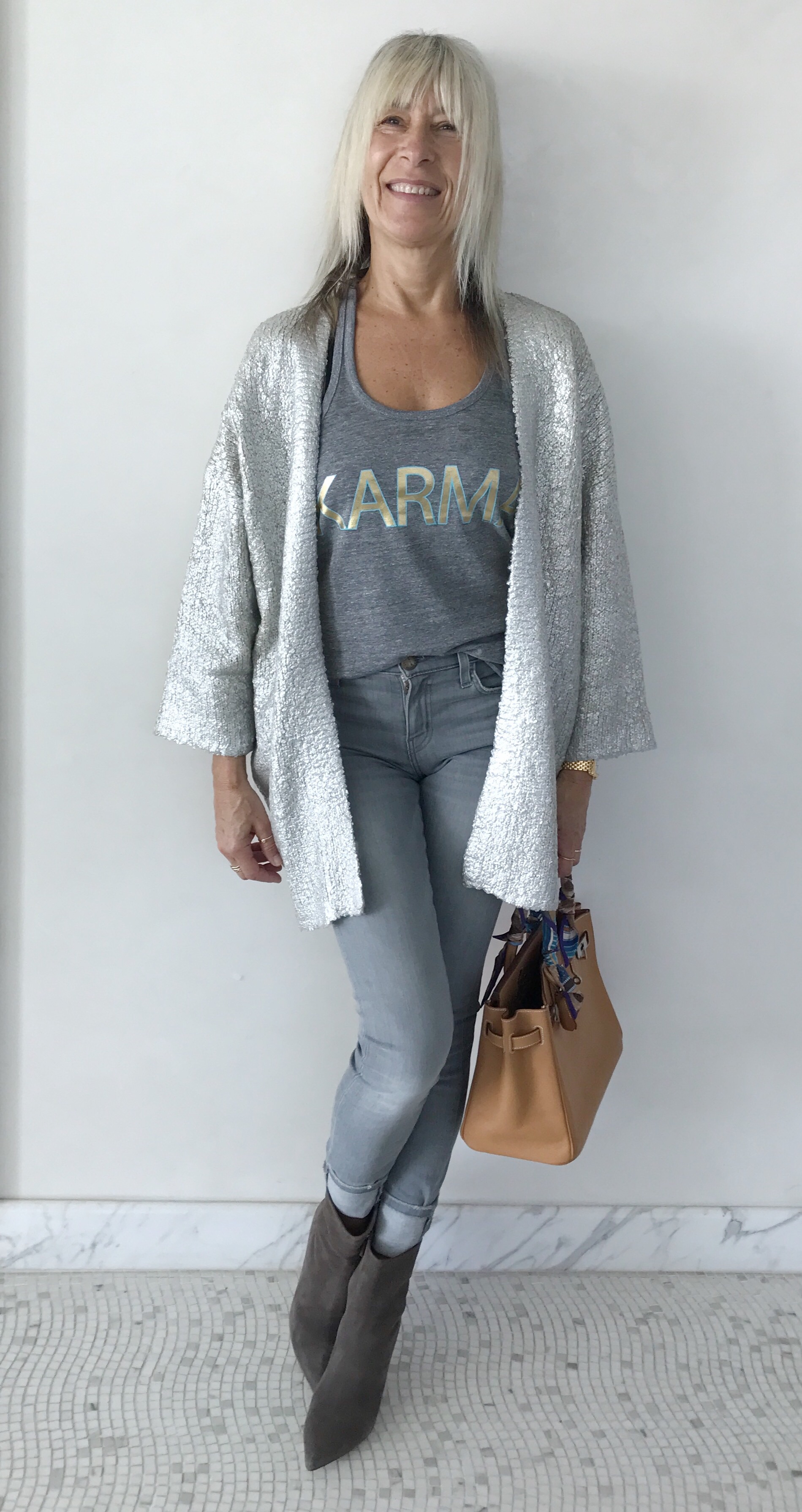 This metallic printed sweater from H & M gives me a polished look and sets off the grey tones for a perfectly coordinated outfit that can take form lunch to cocktails and even into the night.