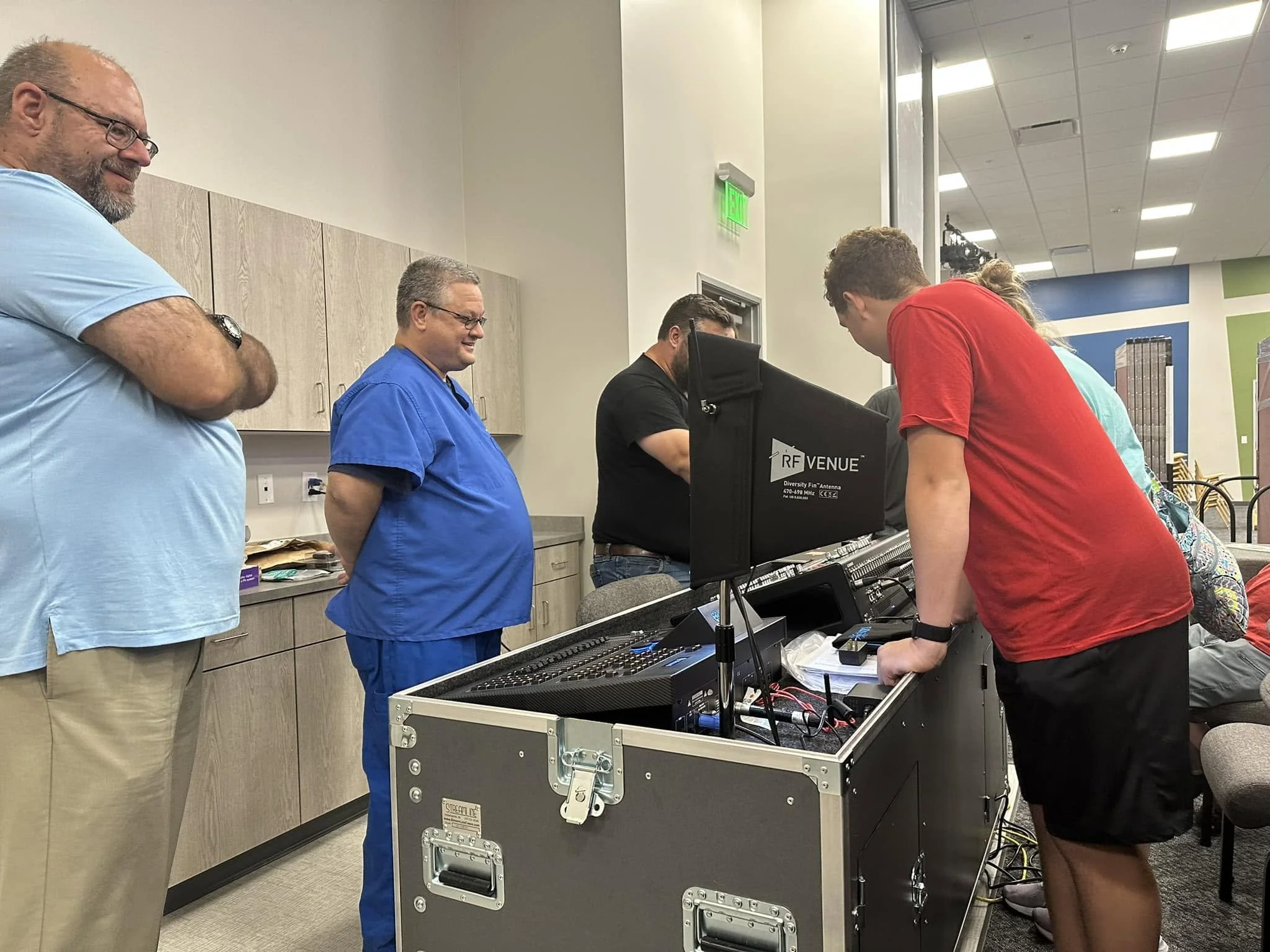 Mitchell Design Group providing hands-on audio, video, and lighting system training for church staff and volunteers